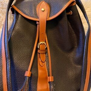 Authentic Dooney & Bourke Black and Tan Leather Backpack